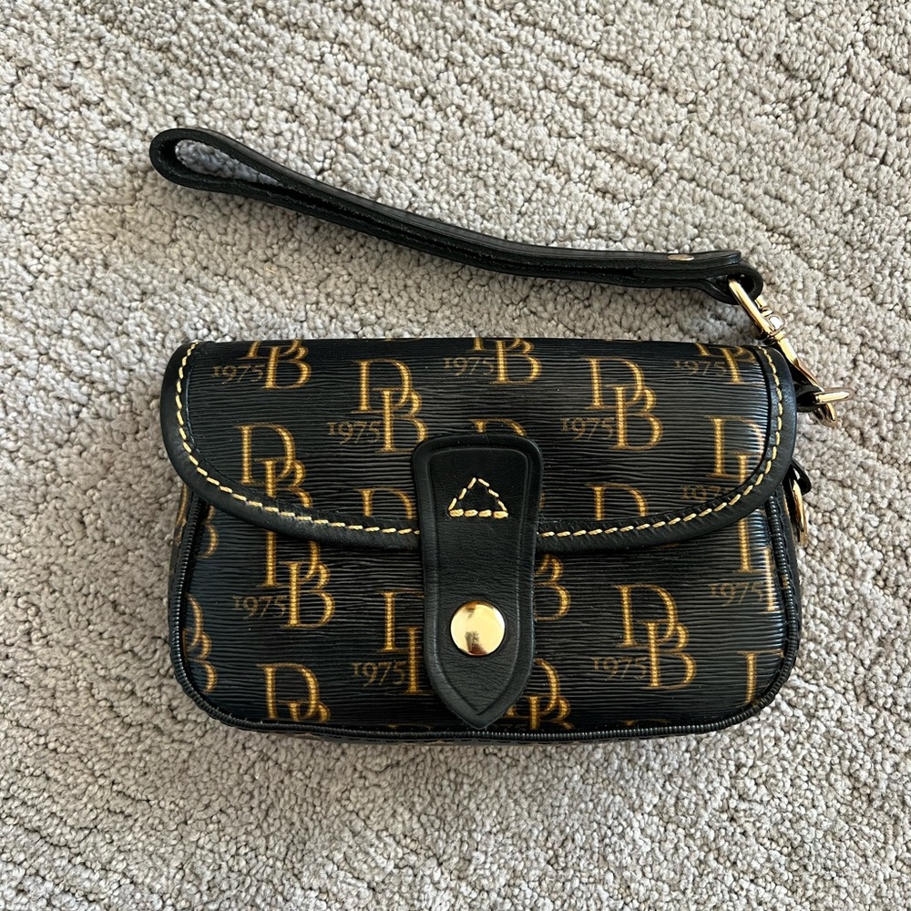 Dooney & Bourke Black and Gold Logo Wristlet